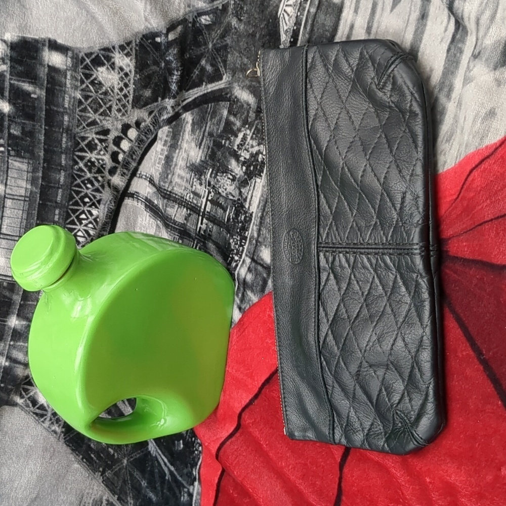 Roots leather clutch